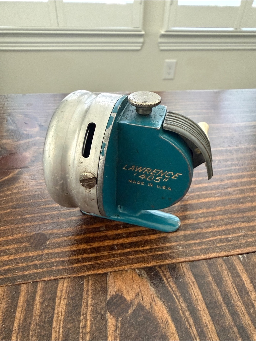 Vintage Fishing Reel in Teal